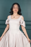 فستان بليسيه بأكمام مميزة