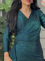 فستان ناعم لون تركوازي وبتصميم يخطف الانظار من لوك...