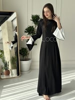 فستان اسود ناعم بلمسات باللون الابيض