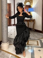 فستان اسود بقصة مائلة