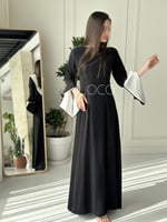 فستان اسود ناعم بلمسات باللون الابيض