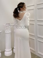 فستان ابيض انيق بلمسات مميزة من الكريستال