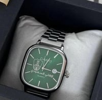 ساعة بشعار الاهلي