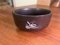 كوب قهوة اسود منقط