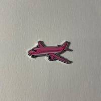 ملصقات معدنية طيارة