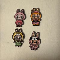 ملصقات معدنية لابوبو