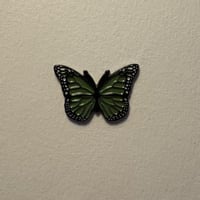 ملصقات معدنية فراشة