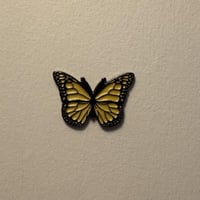 ملصقات معدنية فراشة