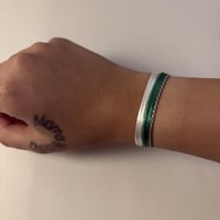 اساور الاهلي ابيض و اخضر منفصلين