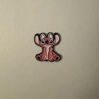 ملصقات معدنية ستيتش وردي