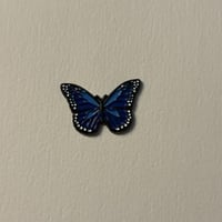 ملصقات معدنية فراشة