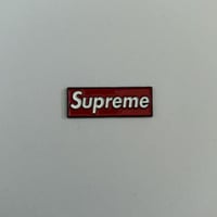 ملصقات معدنية سوبرمي