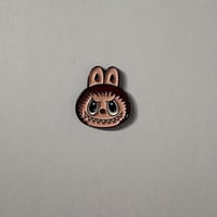 ملصقات معدنية لابوبو