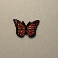 ملصقات معدنية فراشة