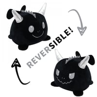 دمية القطة بوجهين