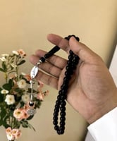 سبحه حجر كريم اسود بالاسم