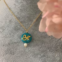 سلسال فيروز مطلى بذهب