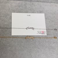 اسواره اف سان لوران كرستال مطليه