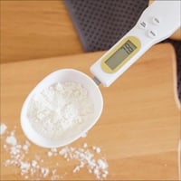 ملعقة قهوة بميزان مدمج