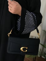 شنطة كوتش تابي