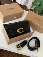 شنطة كوتش تابي