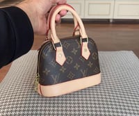 شنطة لويس فيتون بيبي الما