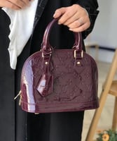 شنطة لويس فيتون بيبي الما