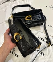 شنطة كوتش تابي