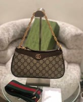 شنطة قوتشي ستراب قماش وسلسال