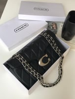 شنطة كوتش تابي