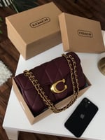 شنطة كوتش تابي