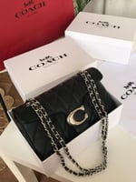 شنطة كوتش تابي