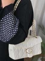 شنطة كوتش تابي