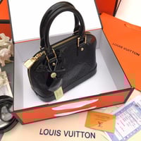 شنطة لويس فيتون بيبي الما