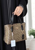 شنطة كوتش مولي توت باق