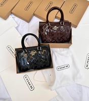 شنطة كوتش لمعه