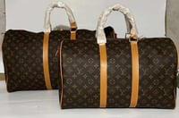 شنط سفر لويس فيتون