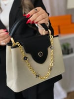 شنطة لويس فيتون كابوسين