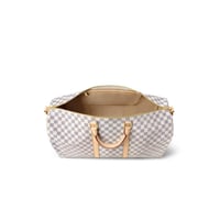 شنطة سفر يد لويس فيتون