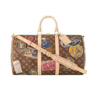 شنطة سفر يد لويس فيتون