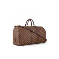 شنطة سفر يد لويس فيتون