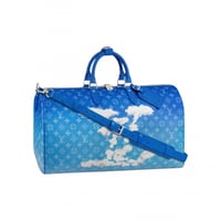 شنطة سفر يد لويس فيتون