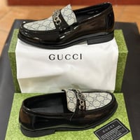 ‏حذاء قوتشي رسمي