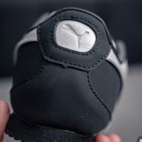 حذاء بوما أسود فضي