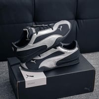 حذاء بوما أسود فضي