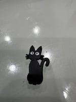 ملصق معدني قط أسود