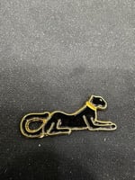 ملصق معدني النمر الأسود