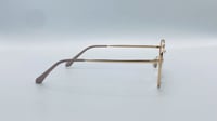 نظاره طبية هندسية من التيتانيوم اللون ذهبي رقم الم...