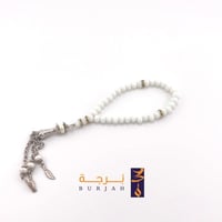 ابيض