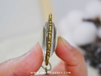 ميدالية نقش جهتين لون برونزي